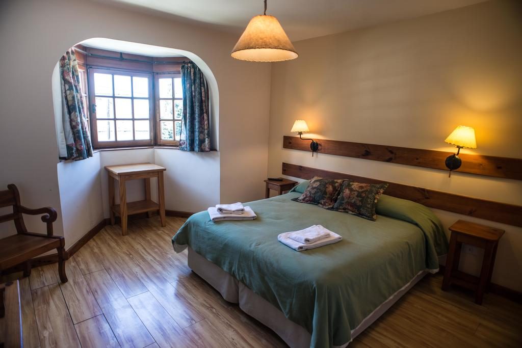 Quarto triplo do Las Marianas Hotel em Bariloche